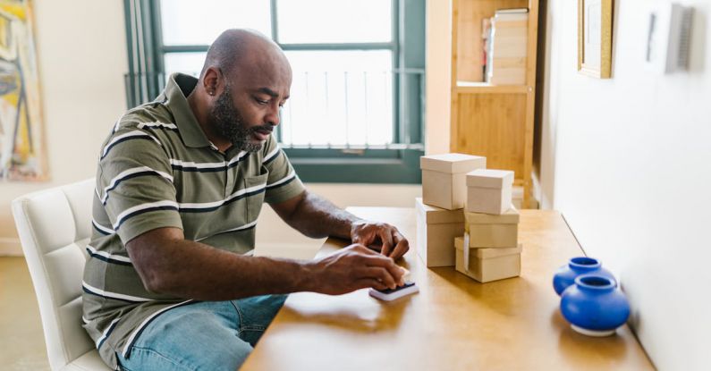 Ceramic Brake Pads - Man Putting Stamps in Ink Pad