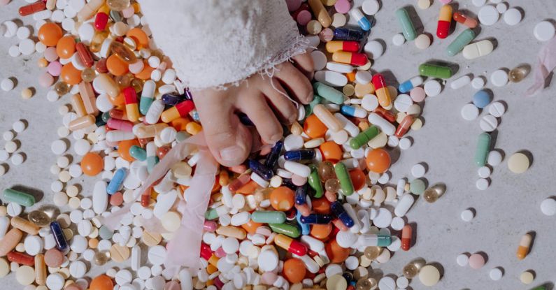 Overheating - Person in White Long Sleeve Shirt Holding Yellow and White Flower Petals