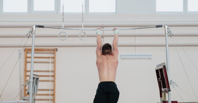 Floor Mats - Man Hanging on Horizontal Bar