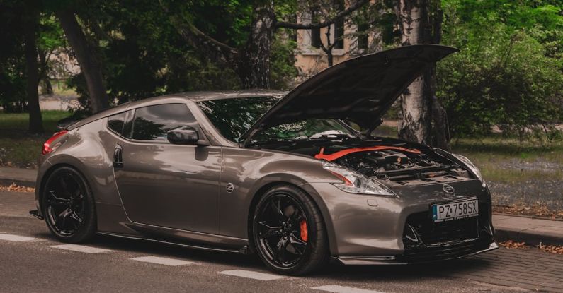 Car Spoilers - A Nissan Coupe Model Z with a Open Hood