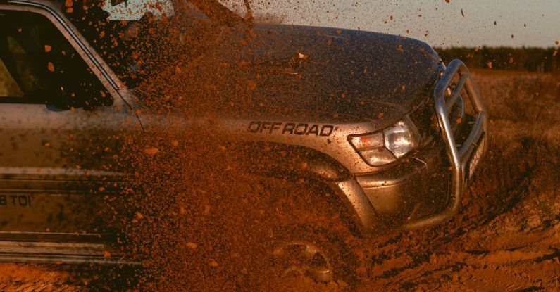Winter Tires - Photo Of A 4x4 Off Road Car Under Blue Sky